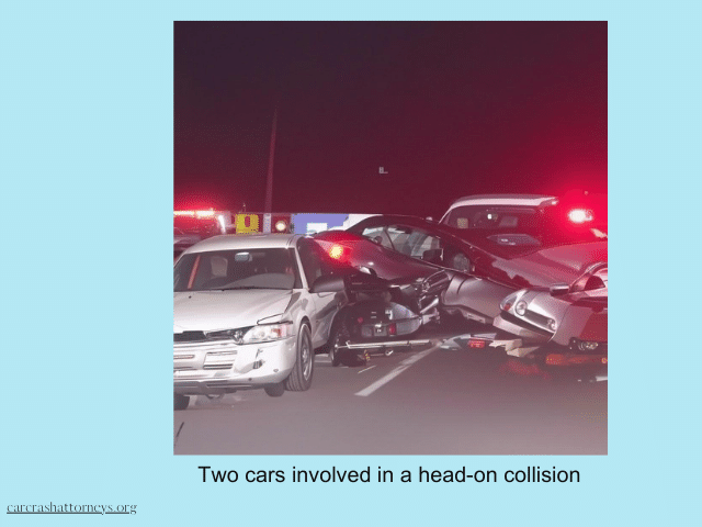 Two cars involved in a head-on collision