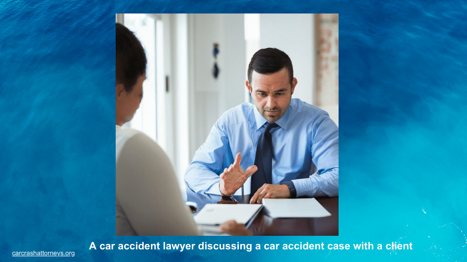 A car accident lawyer discussing a car accident case with a client